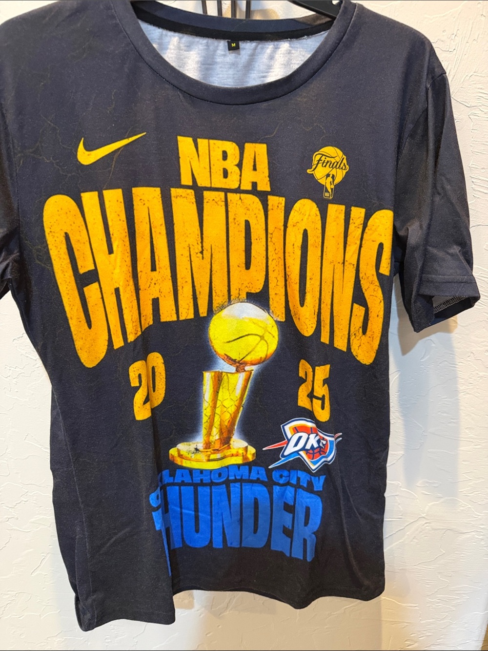 Nike Black Tee with Yellow and Blue Oklahoma City Thunder Champions Graphic